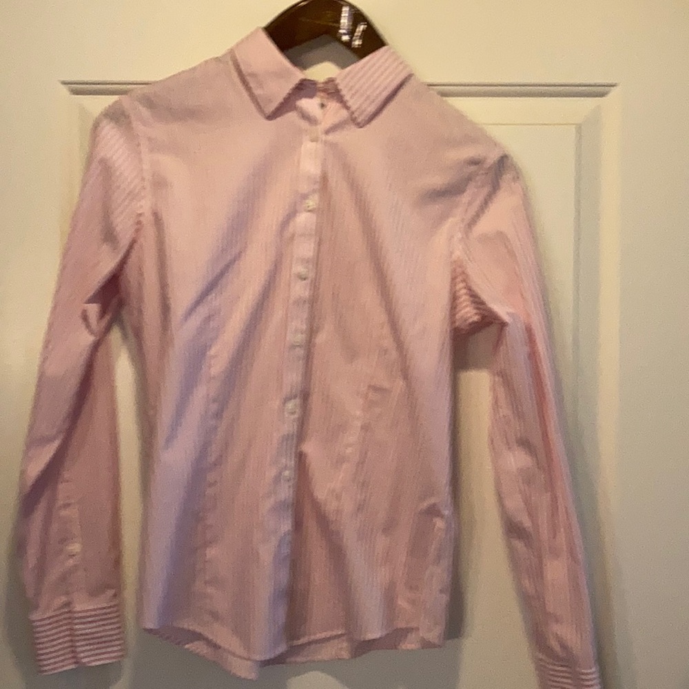 Like new. Pink and white pinstripes with French cuffs.
